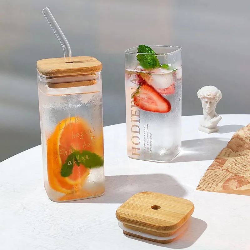 Eco-friendly glass cup with bamboo lid and straw