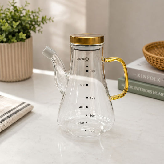 750ml heatproof glass oil pot with clear body and easy-pour design for storing and dispensing cooking oil, vinegar and other kitchen condiments.