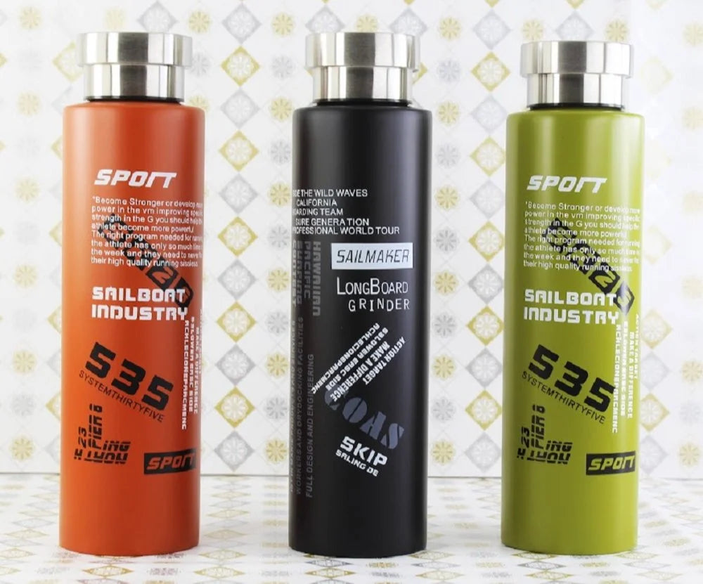 Three cylindrical bottles with labels on a decorative background