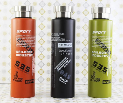 Three cylindrical bottles with labels on a decorative background
