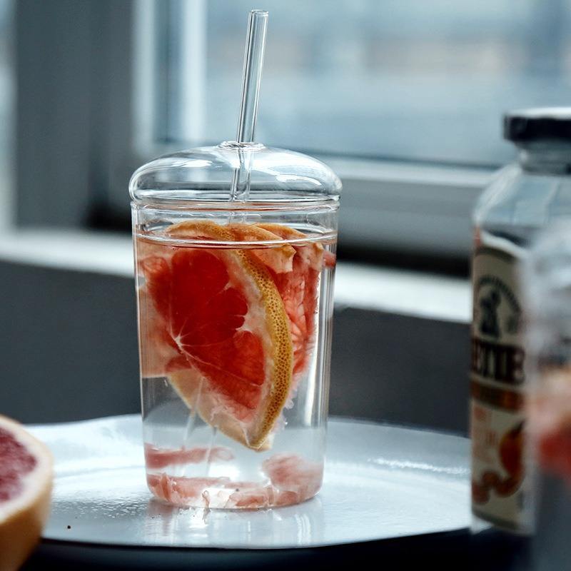 
Clear borosilicate glass tumbler with reusable glass straw
