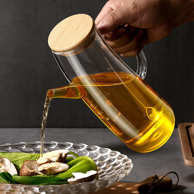 
Eco-friendly glass oil container with bamboo lid