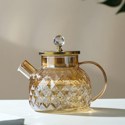 
Elegant glass tea pitcher with secure lid
