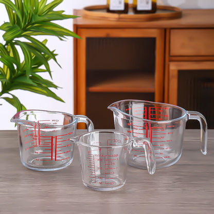 
Glass measuring cup for coffee, milk, and baking ingredients