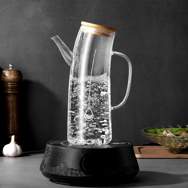 
Glass oil dispenser with natural bamboo lid
