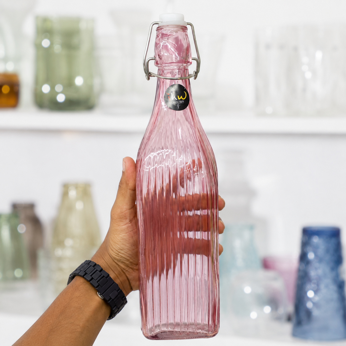 
Stylish reusable green glass beverage bottle
