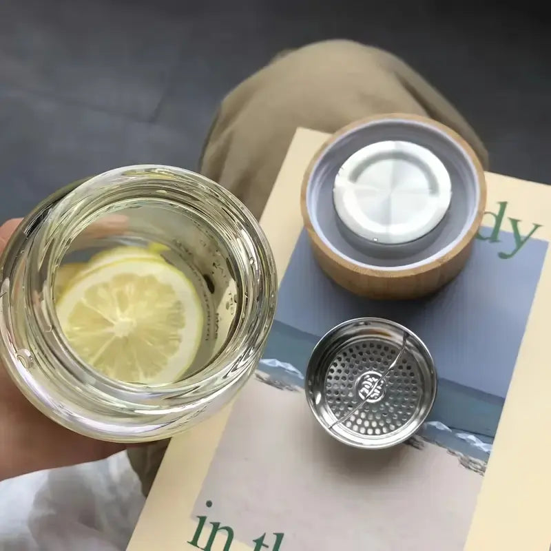 Heat resistant transparent glass bottle with hydration time marker