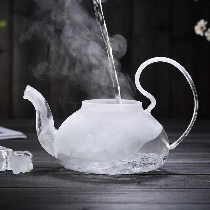 
Modern glass tea serving pot with matching lid