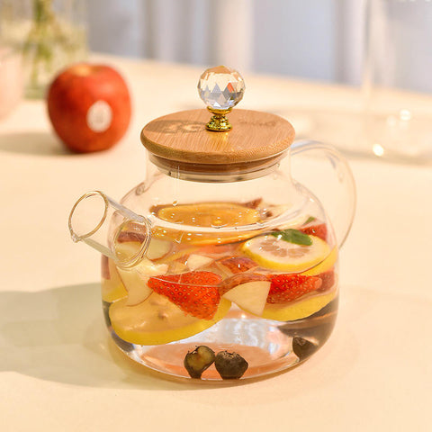 
Premium glass teapot with matching tea cups and wooden holder