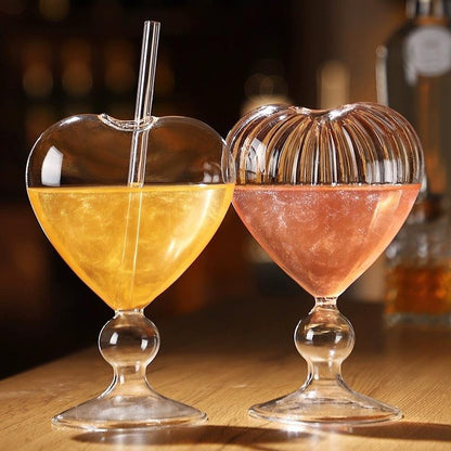Unique heart-shaped wine drinking goblet with straw